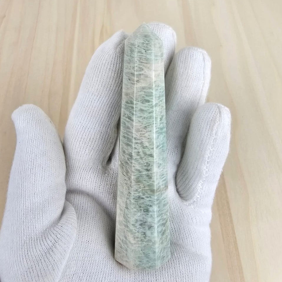 amazonite tower hold in a white glove