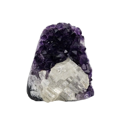 Amethyst crystal with clear quartz inside on a white background