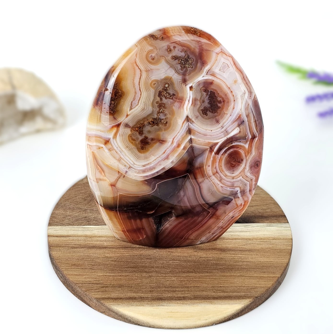 Decorative carnelian a wooden stand with a blurred background