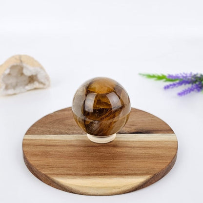 Dark golden healer on a wooden stand