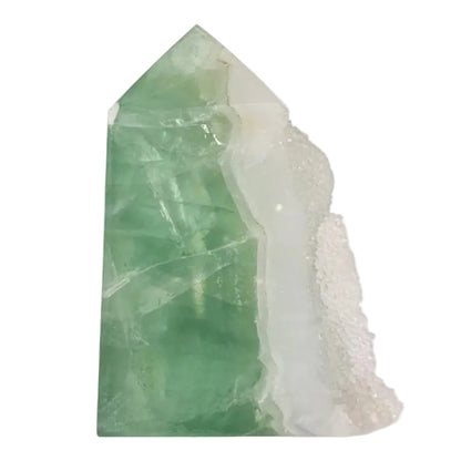 Green fluorite with naturel druzy crystal on a white pedestal against a white background