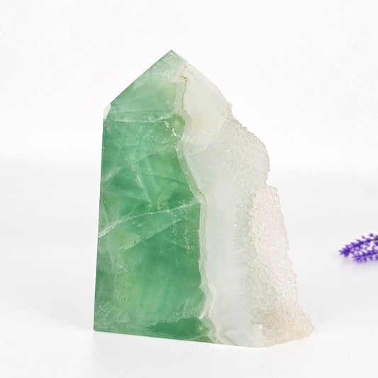 green fluoriet with druzy on a white background