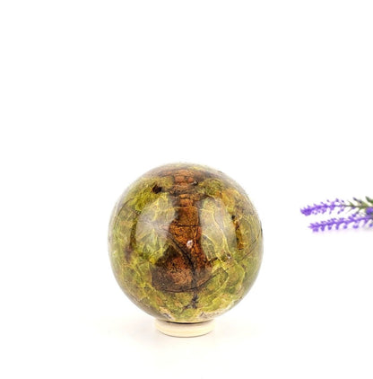 Green opale sphere on a white background