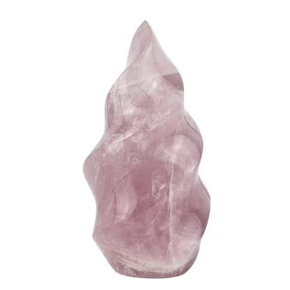 Rose quartz flame sculpture  crystal on a white background