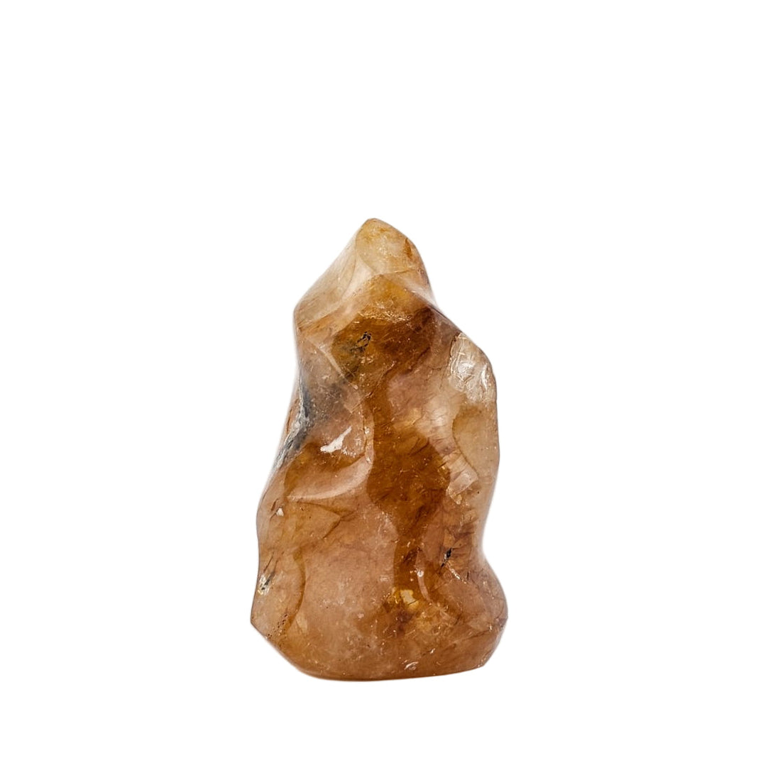 Golden healer flame sculpture on a white background