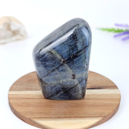 Labradorite back on wooden stand