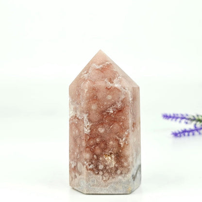 Pink amethyst high quality tower from brazil on a white background