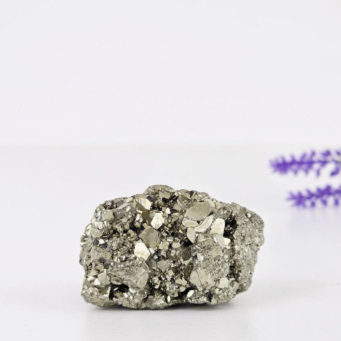 Pyrite raw on a white background
