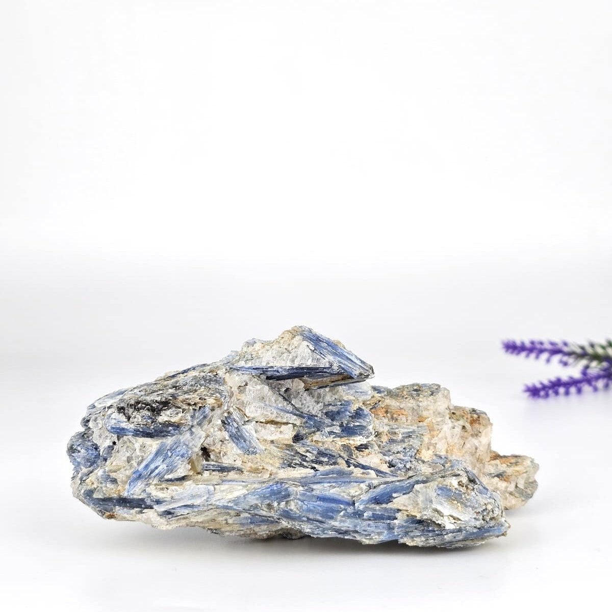 Raw kyanite in matrix from Brazil and a white background