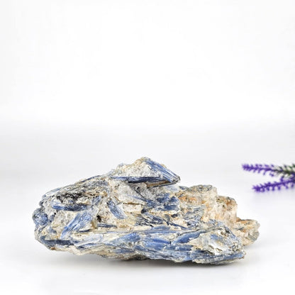 Raw kyanite in matrix from Brazil and a white background