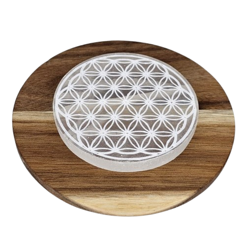 Round charging disc with a geometric design on a white background