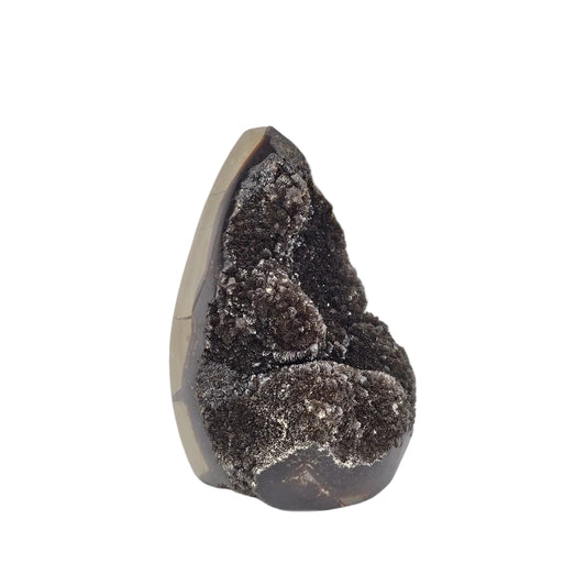 Septarian sculpture with aragonite crystals on a white background