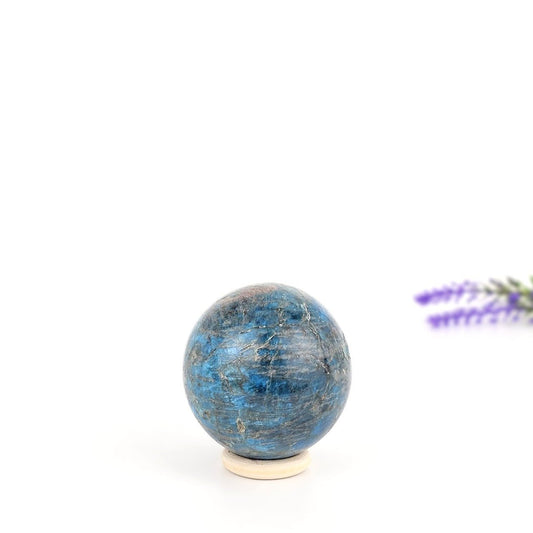 blue apatite sphere on a white background
