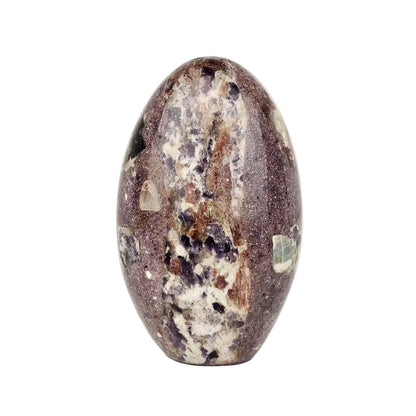 lepidolite in pegmatite freeform on a white background