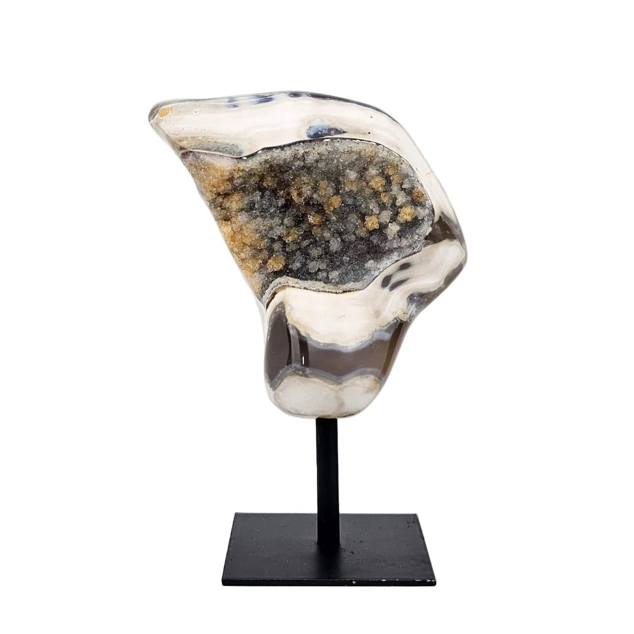 orca agate with druzy on a black stand and a white background