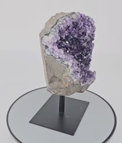 Amethyst geode on stand